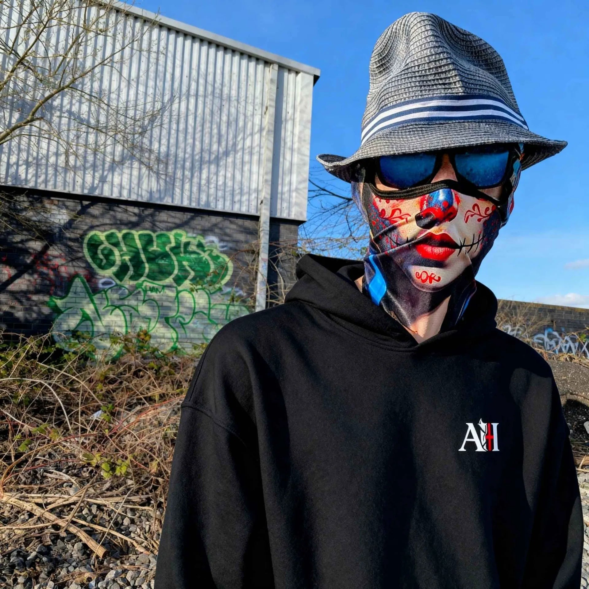 The Sun Walker Albert Harry hoodie fashion Manchester graffiti location.